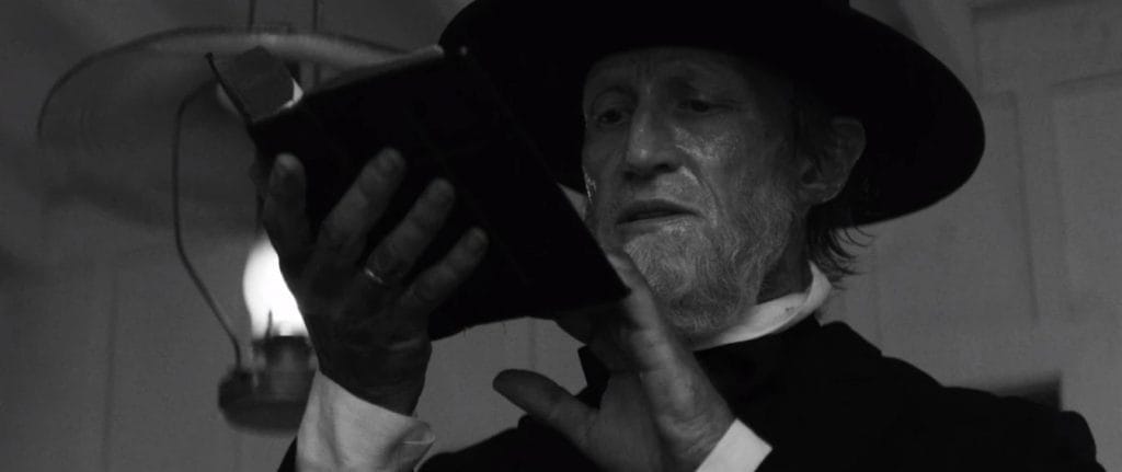 black-hat-man Them; Black hat man.