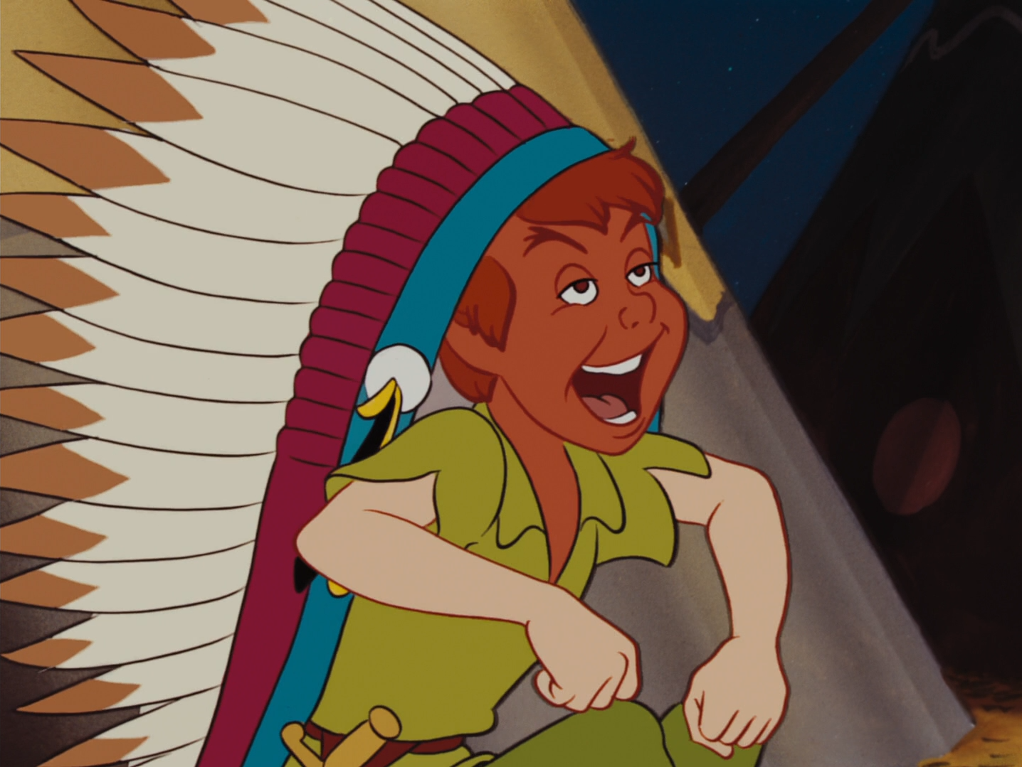 Tigrilla besa a Peter Pan en la nariz y Peter se sonroja.