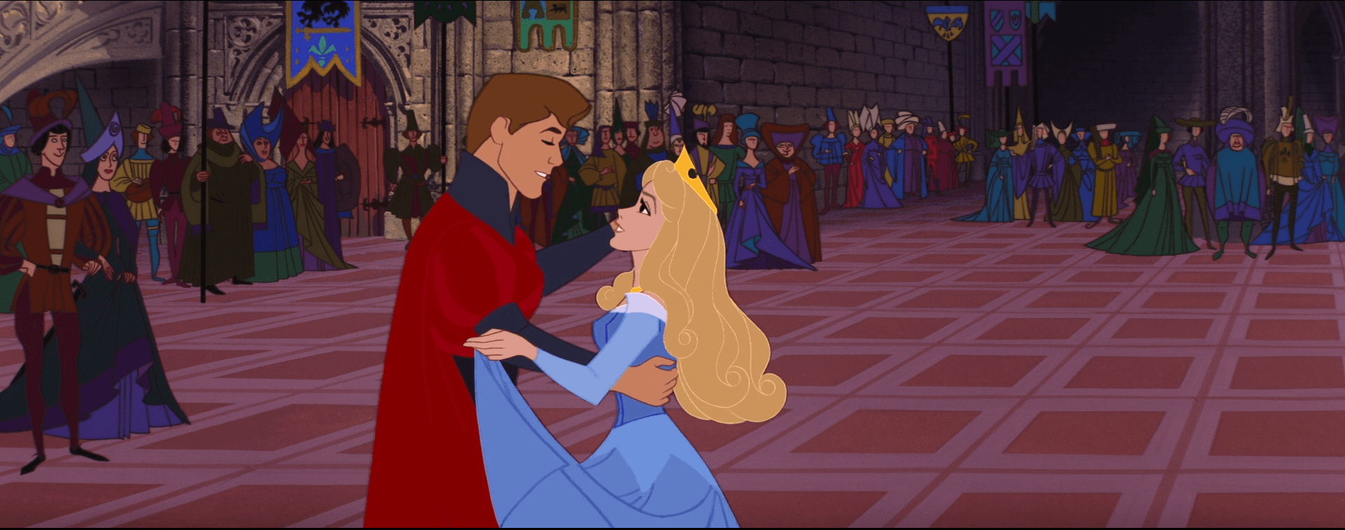 Aurora y Felipe bailan frente a sus súbditos en La bella durmiente.